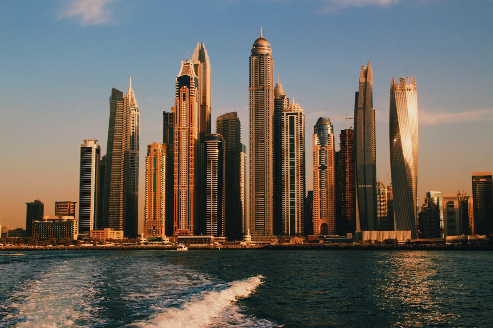Dubai Marina skyline at golden hour — holiday home areas managed by Purple Holiday Homes
